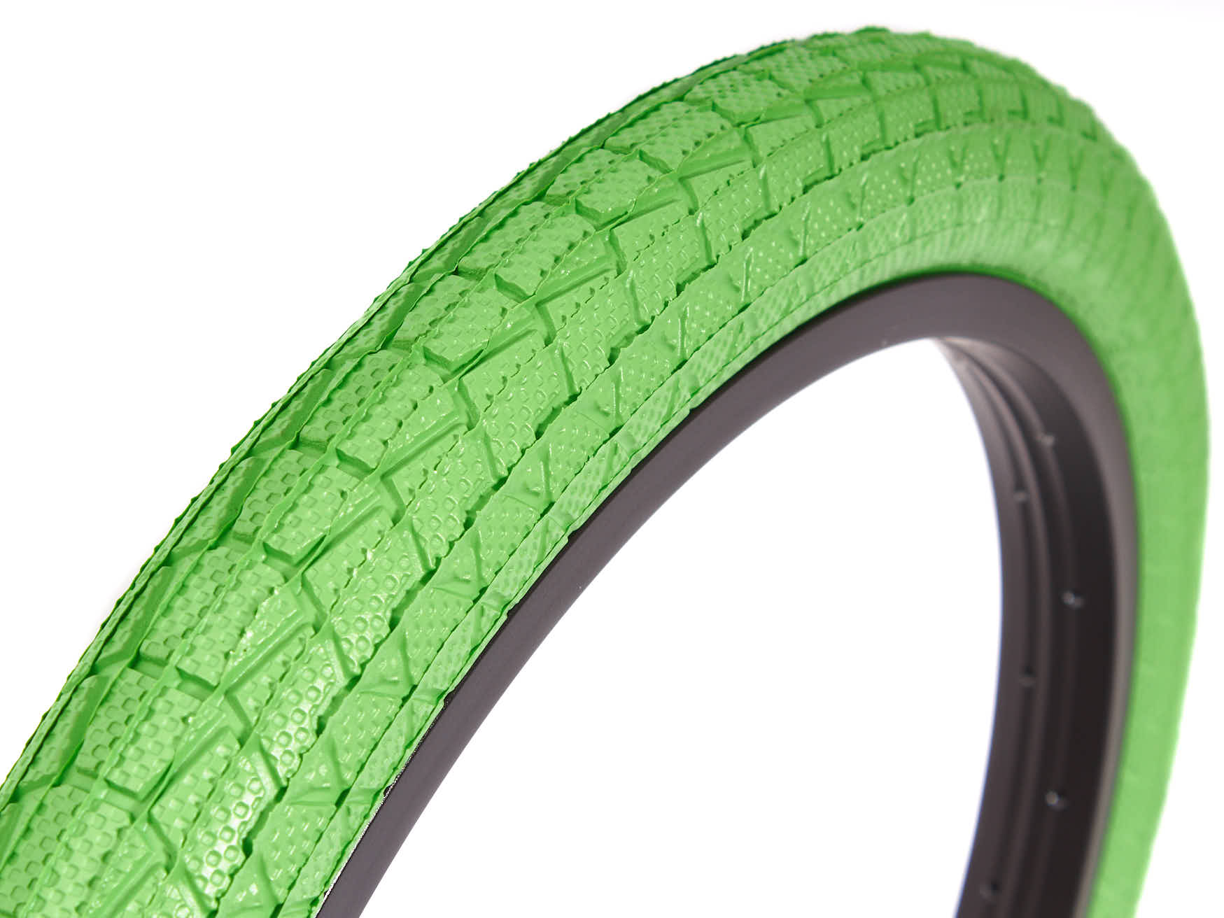 Grüner BMX Reifen mit schwarzer Felge